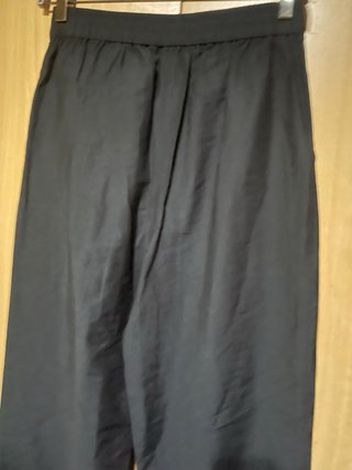 Pantalones negros de tela