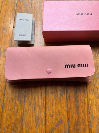 Occhiali da sole Miu Miu SMU04Z tartarugati