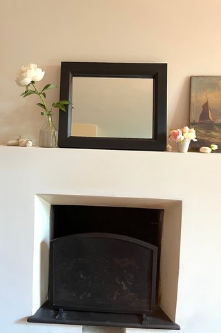 Specchio con cornice in legno nero