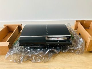 PlayStation 3 60GB Sony y 5 juegos