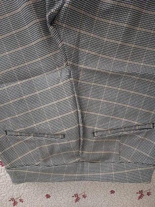 Pantalón pitillo cuadros beige y gris