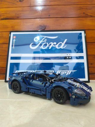 Set de coche más cuadro expositor lego technic.