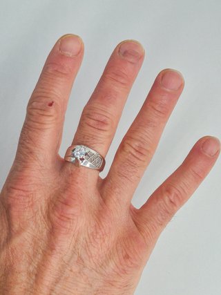 049-01-00165Anillo Oro Blanco 18K Diamante Central