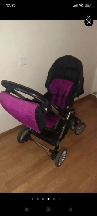 Carro de bebé rosa con saco