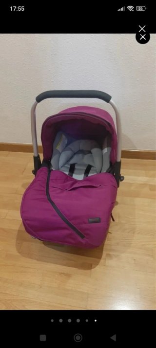 Carro de bebé rosa con saco