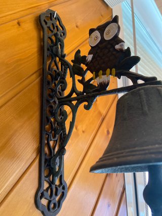 Campana decorativa de pared con búho