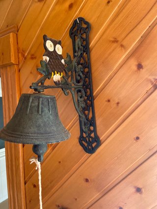 Campana decorativa de pared con búho