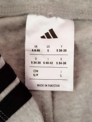 Leggings Adidas grigi con bande
