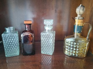 Juego de 4 Botellas de Cristal Antiguas