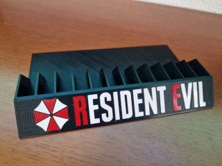 Soporte expositor 12 juegos Resident Evil