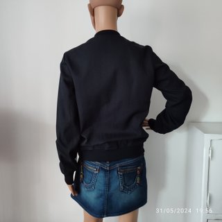 Giubbottino K-Way nero con zip colorata