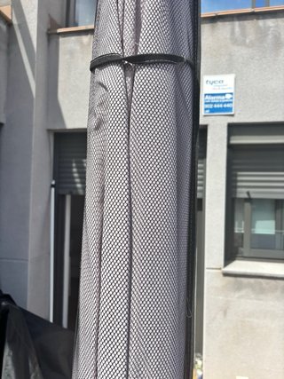 Parasol con pie