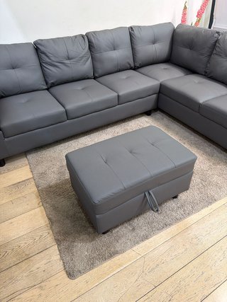 Sofá modular gris de piel sintética