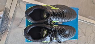 Scarpe da calcio Joma nere e verdi