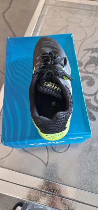 Scarpe da calcio Joma nere e verdi