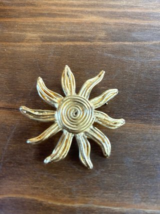 Spilla Sole Yves Saint Laurent Oro