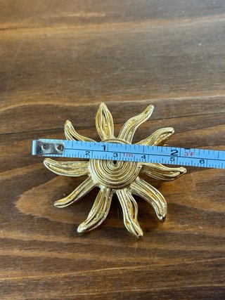 Spilla Sole Yves Saint Laurent Oro