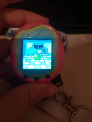 Tamagotchi Uni Rosa con Lanyard