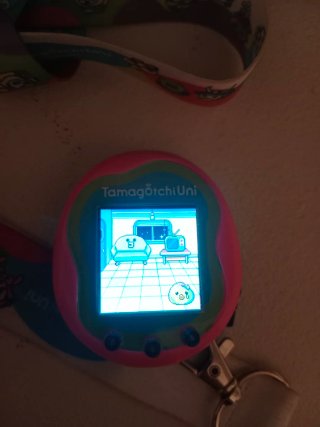 Tamagotchi Uni Rosa con Lanyard