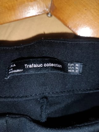 Pantaloni donna neri con banda bianca