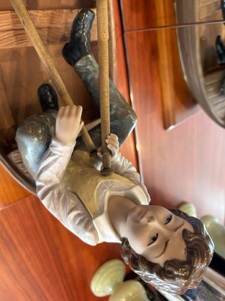 Figura decorativa pareja en barca