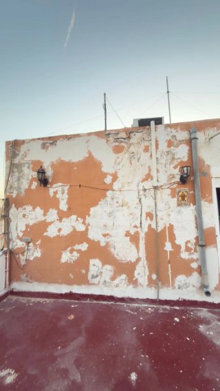 Reparación y enlucido grieta fachada