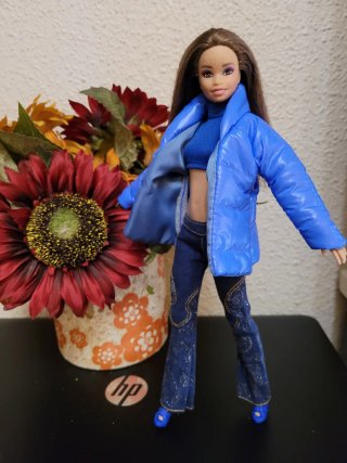 Muñeca barbie con ropa de invierno