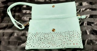 Bolso troquelado sobre/bandolera