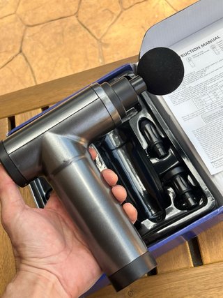 Pistola de masaje