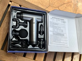 Pistola de masaje