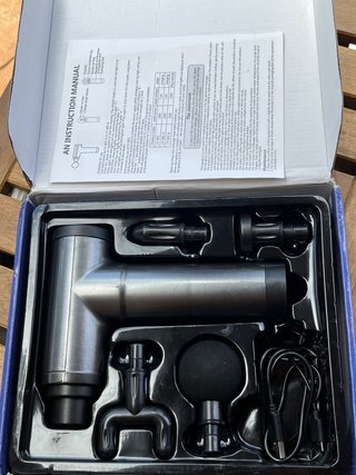 Pistola de masaje
