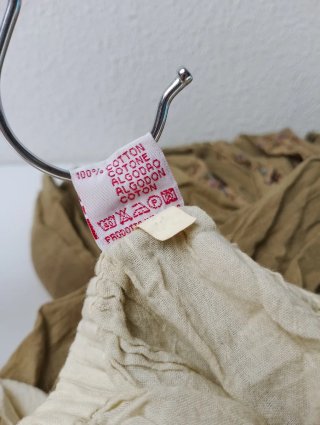 Falda arrugada con pedrería beige/marrón