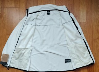 Chaqueta The North Face Negra y Blanca crema