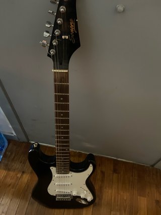 Guitarra eléctrica sonora tipo Stratocaster +funda