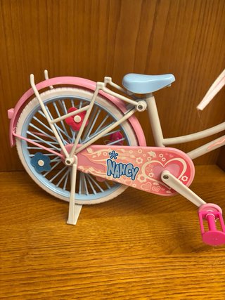 Bicicleta de juguete rosa y azul Nancy