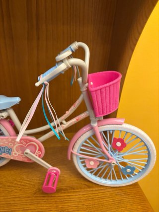 Bicicleta de juguete rosa y azul Nancy