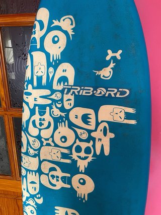 Tabla de surf azul
