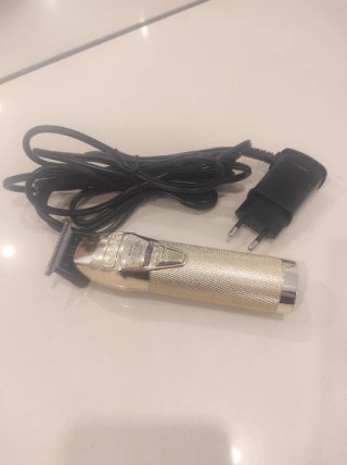 Cortapelos profesional dorado con cargador