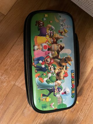 Nintendo Switch + Mario Kart + FC 24 + Mando Pro
