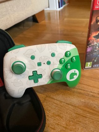 Nintendo Switch + Mario Kart + FC 24 + Mando Pro