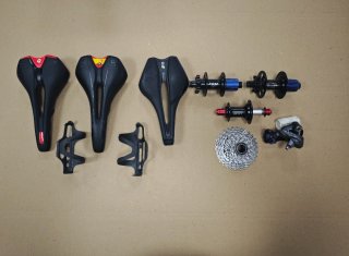 Lote piezas bici: sillines, portabidones, bujes, c