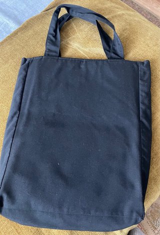 Bolso Perpetuem Mobile negro con detalles