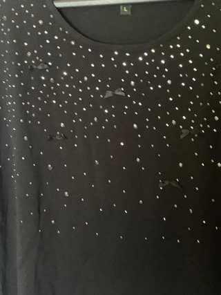 Maglia nera con strass e fiocchetti a manica lunga