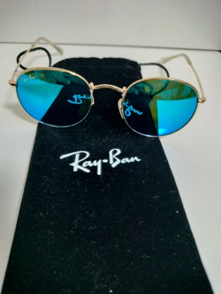 Gafas de sol Ray-Ban doradas y azules