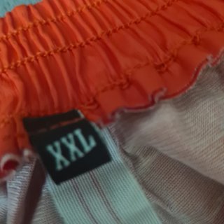 Pantalón impermeable moto rojo