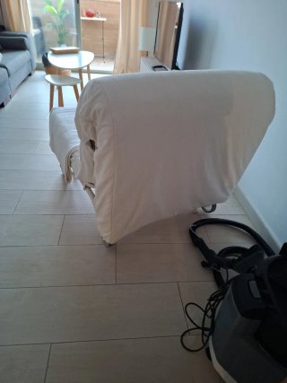 Sillón cama con ruedas de  tela y estructura de me