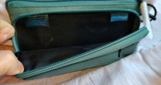 Pochette Piquadro uomo polso verde