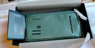 Pochette Piquadro uomo polso verde