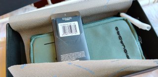 Pochette Piquadro uomo polso verde
