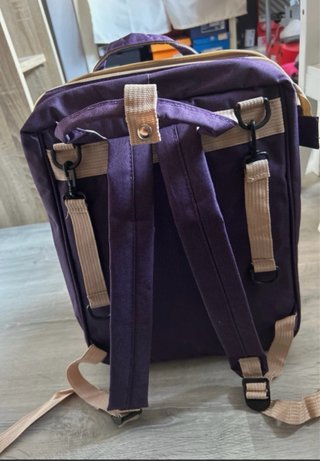 Mochila, cambiador y cuna portátil.